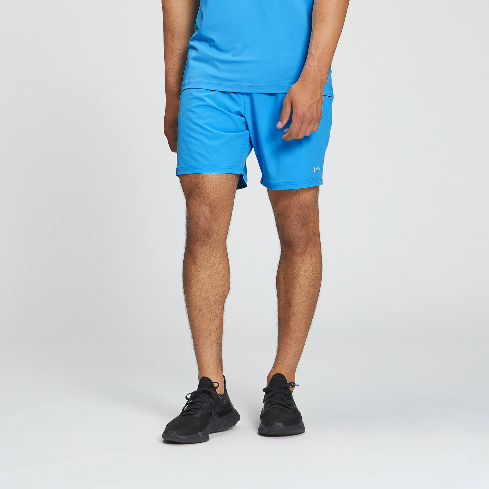 Short d’entraînement en matière tissée MP pour hommes – Bleu vif
