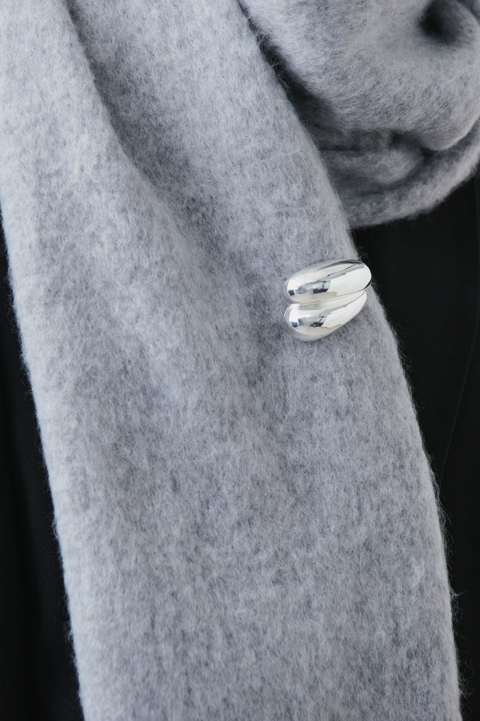 Uneven brooch