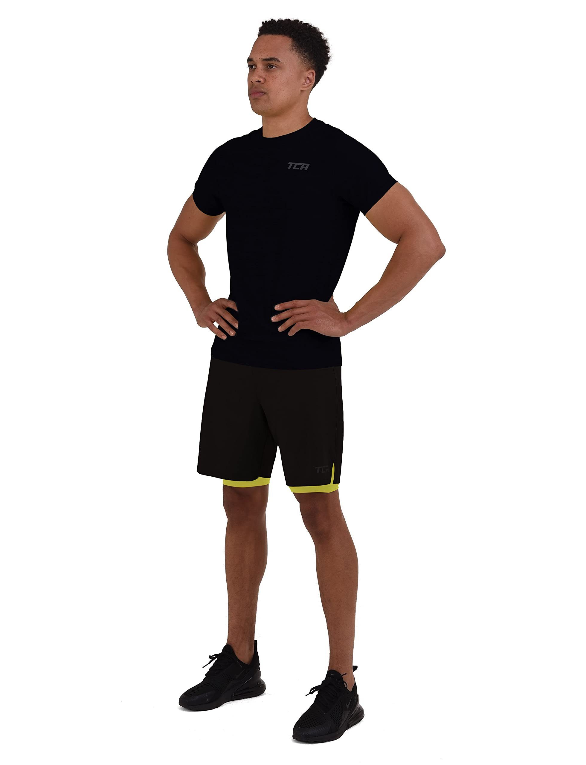 TCA Trainingsshorts TCA Herren 2 in 1 Laufhose mit Kompressionshose - Schwarz/Grün, M