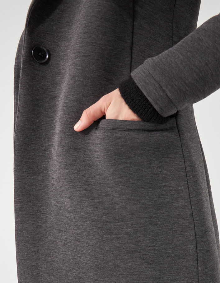 Manteau long en néoprène et capuche amovible femme
