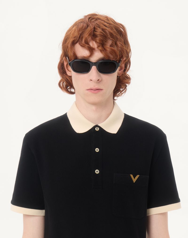 Valentino katoenen piqué poloshirt met V-gouden accenten