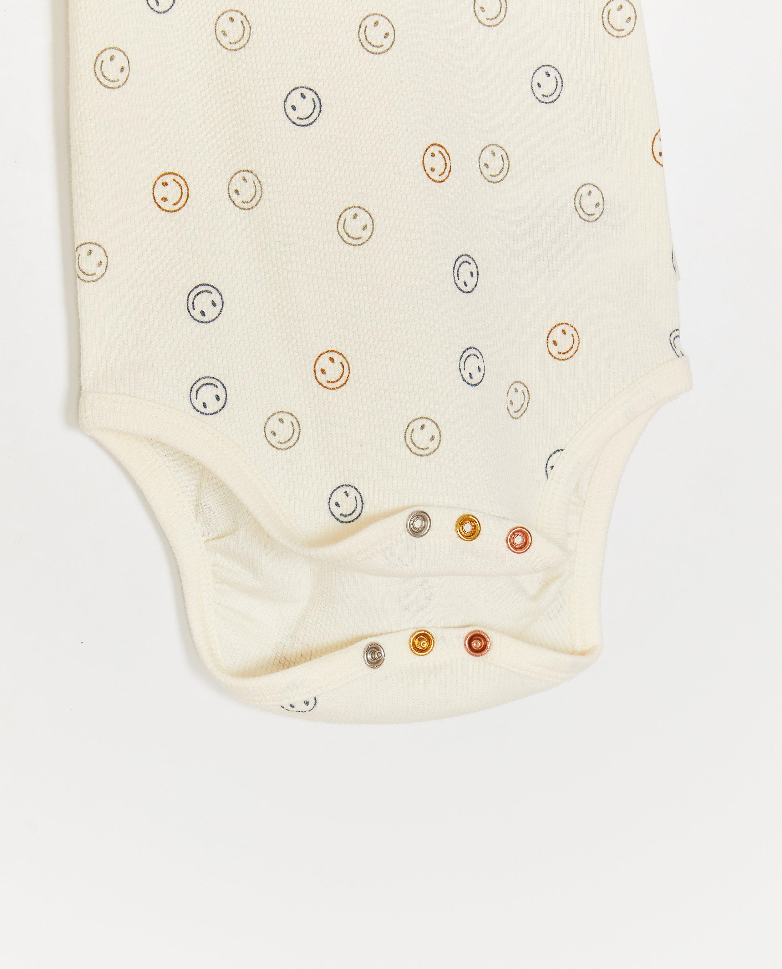 Cuddles and Smiles Romper med kuvertficka