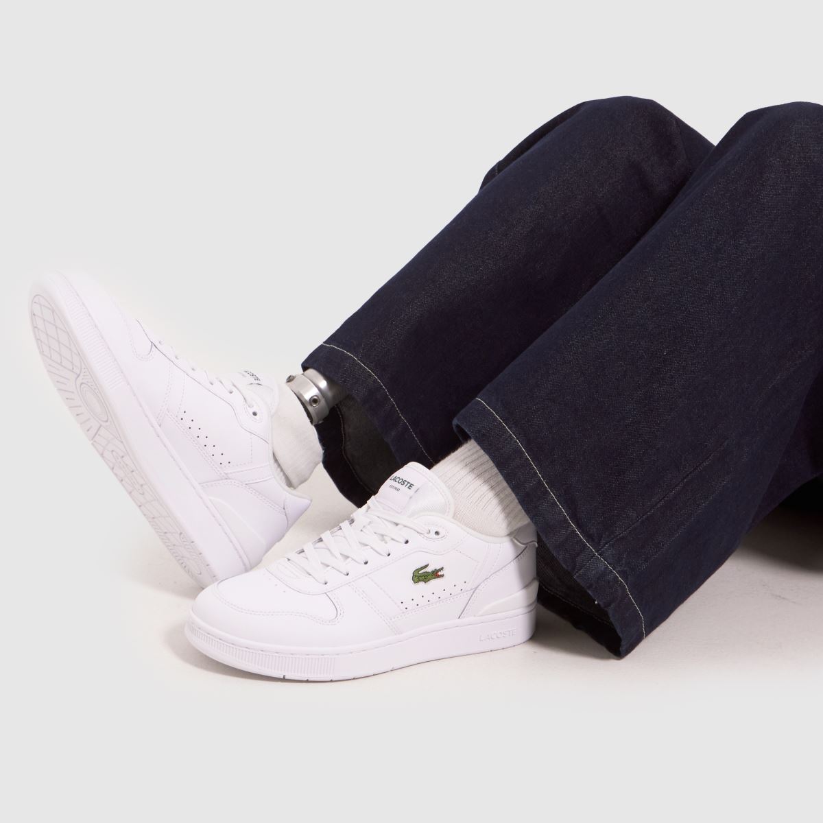 Lacoste – Vita träningsskor med t-clips