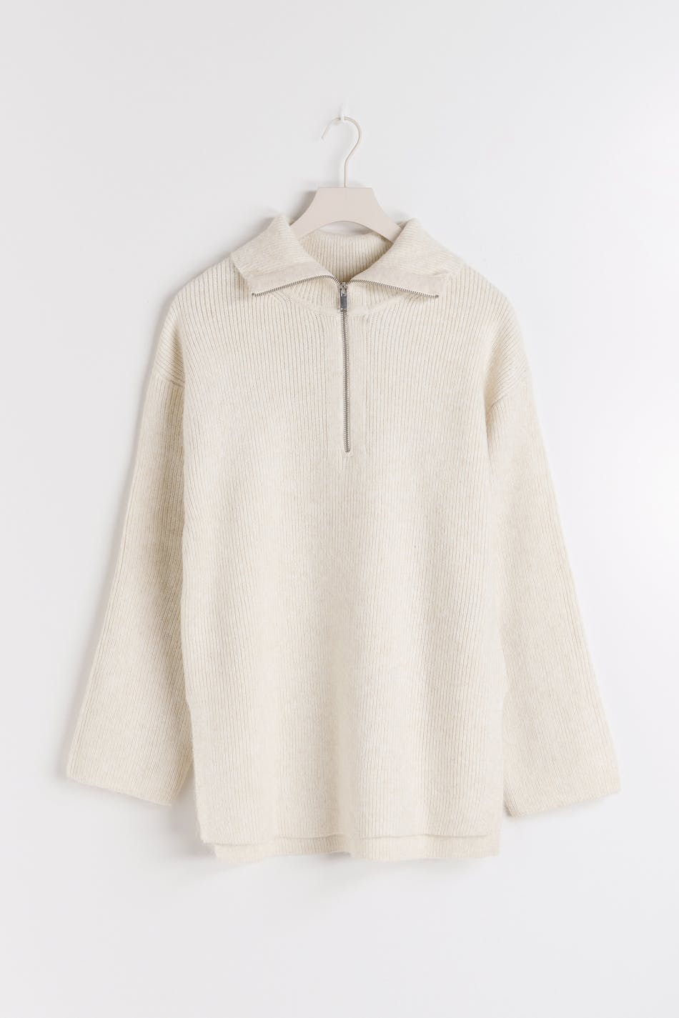 Long knitted zip sweater