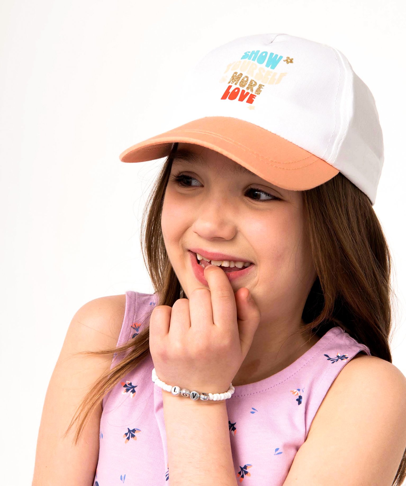Casquette fille avec inscription pailletée et noeud sur l’arrière