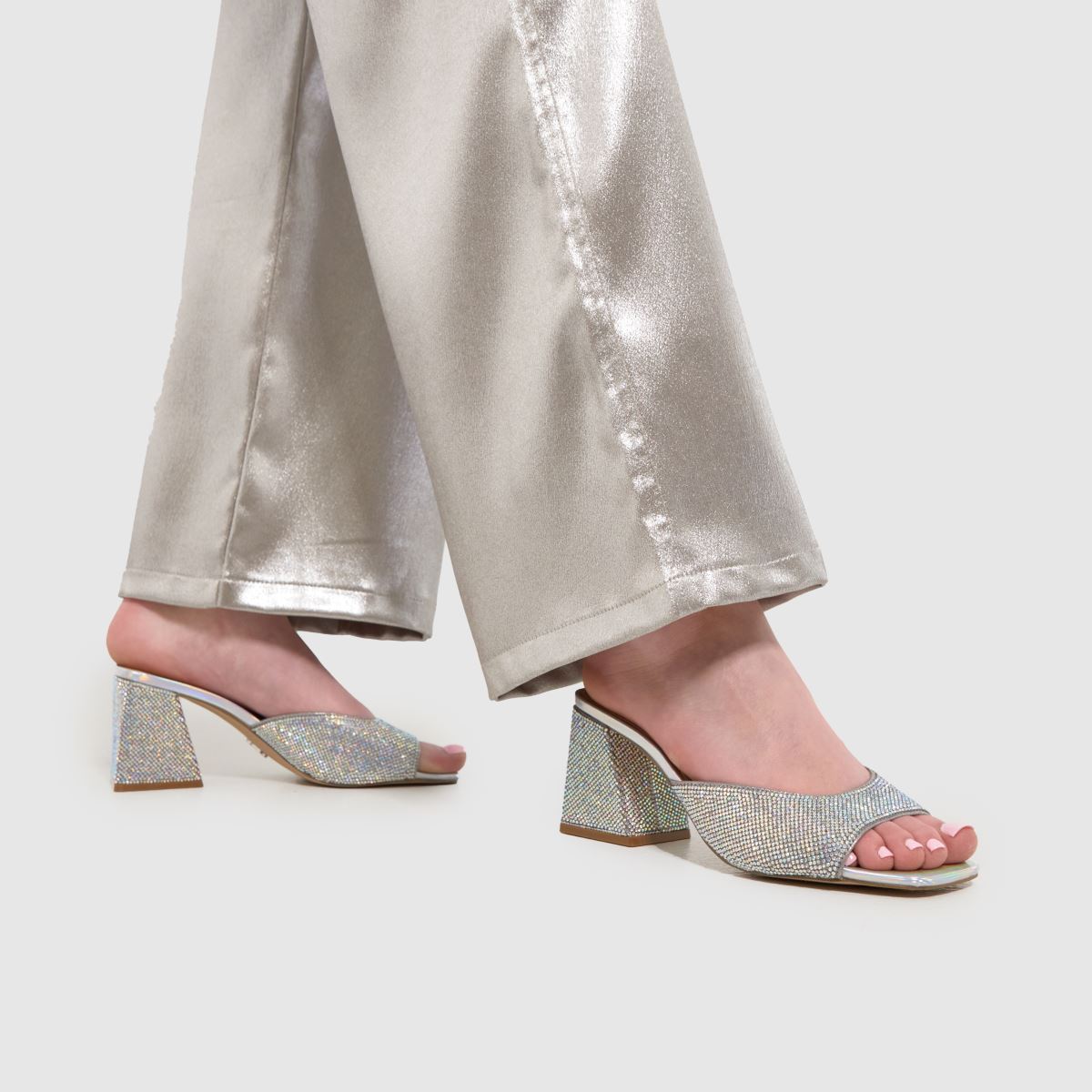 Steve Madden – Silverfärgade mules med hög klack och glödande klack