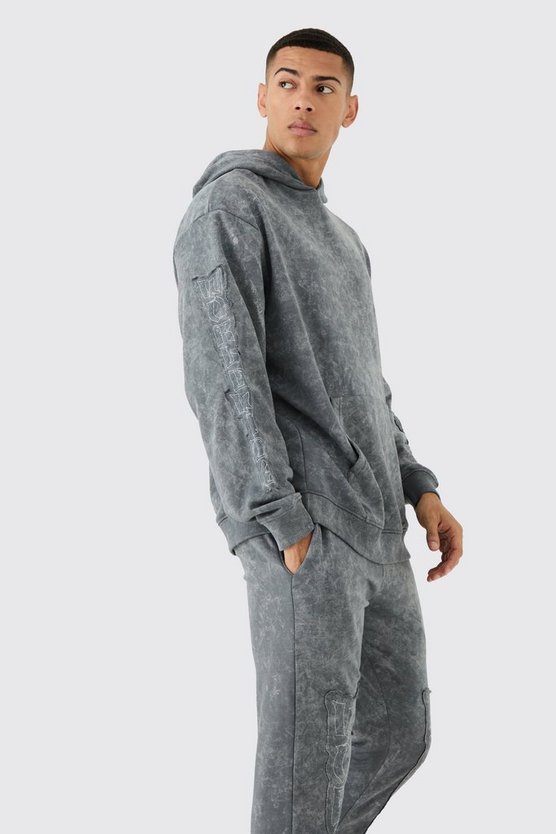 Oversize Worldwide Trainingsanzug mit rohem Saum und Applikation