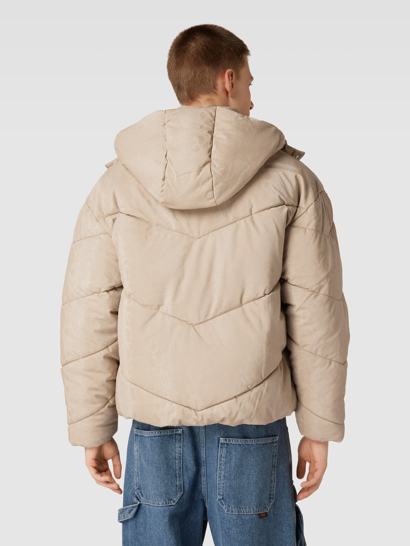 Steppjacke mit Schlangenmuster in ecru