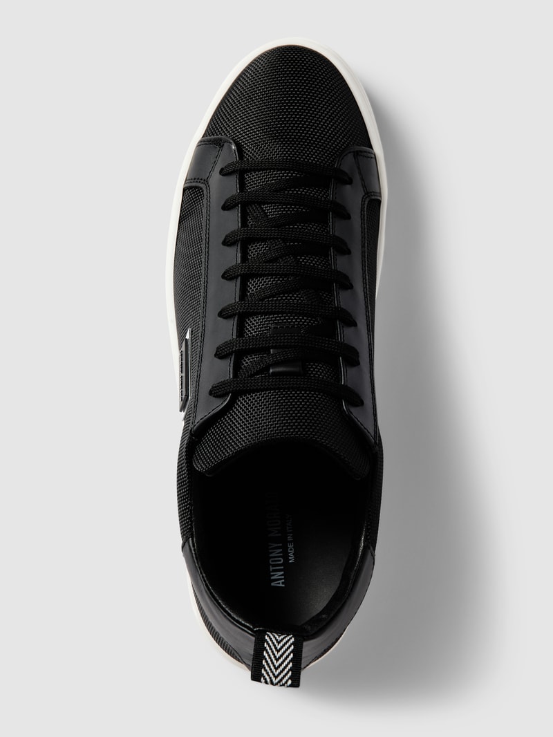 Sneaker mit Label-Details Modell 'PLAKETTE' in schwarz