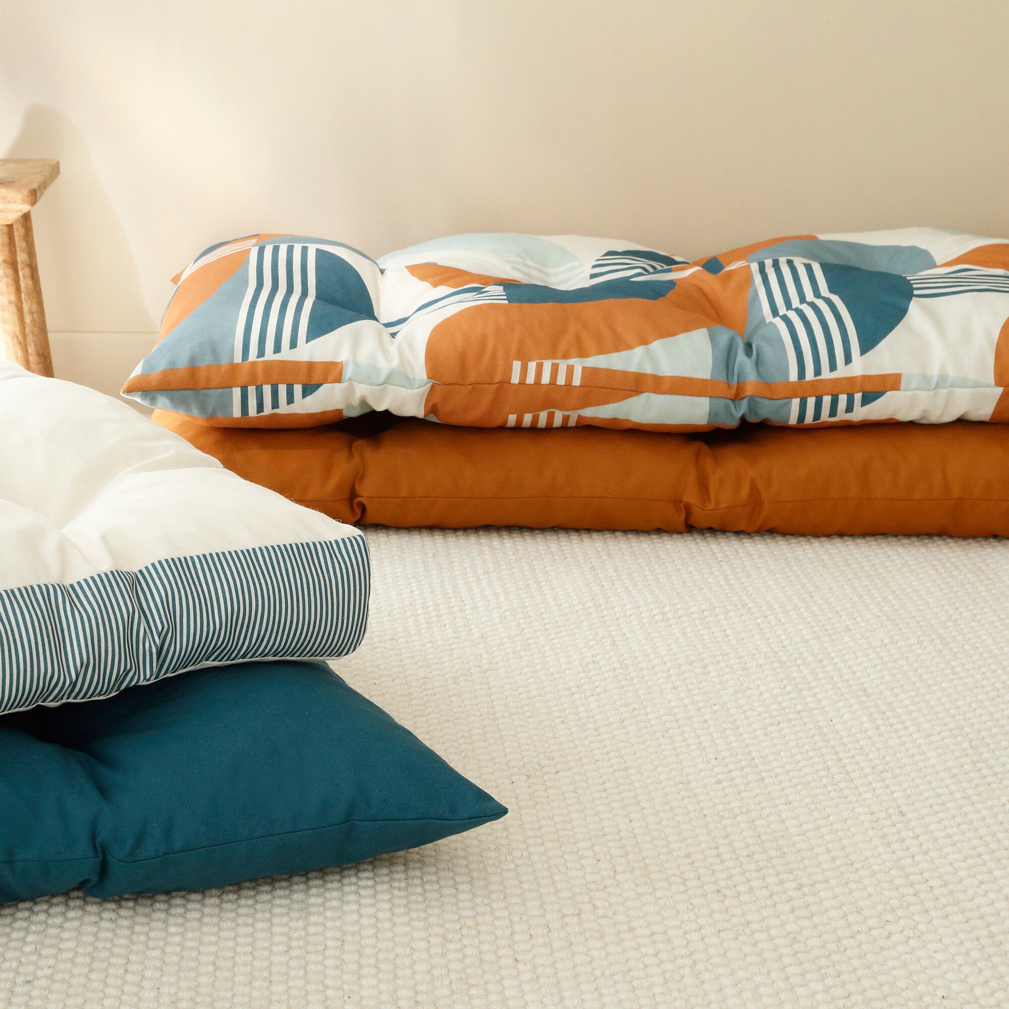 Long coussin de sol uni