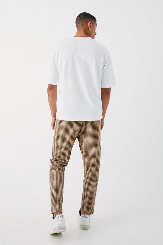 Schmale elastische Hose mit Hahnentritt-Print