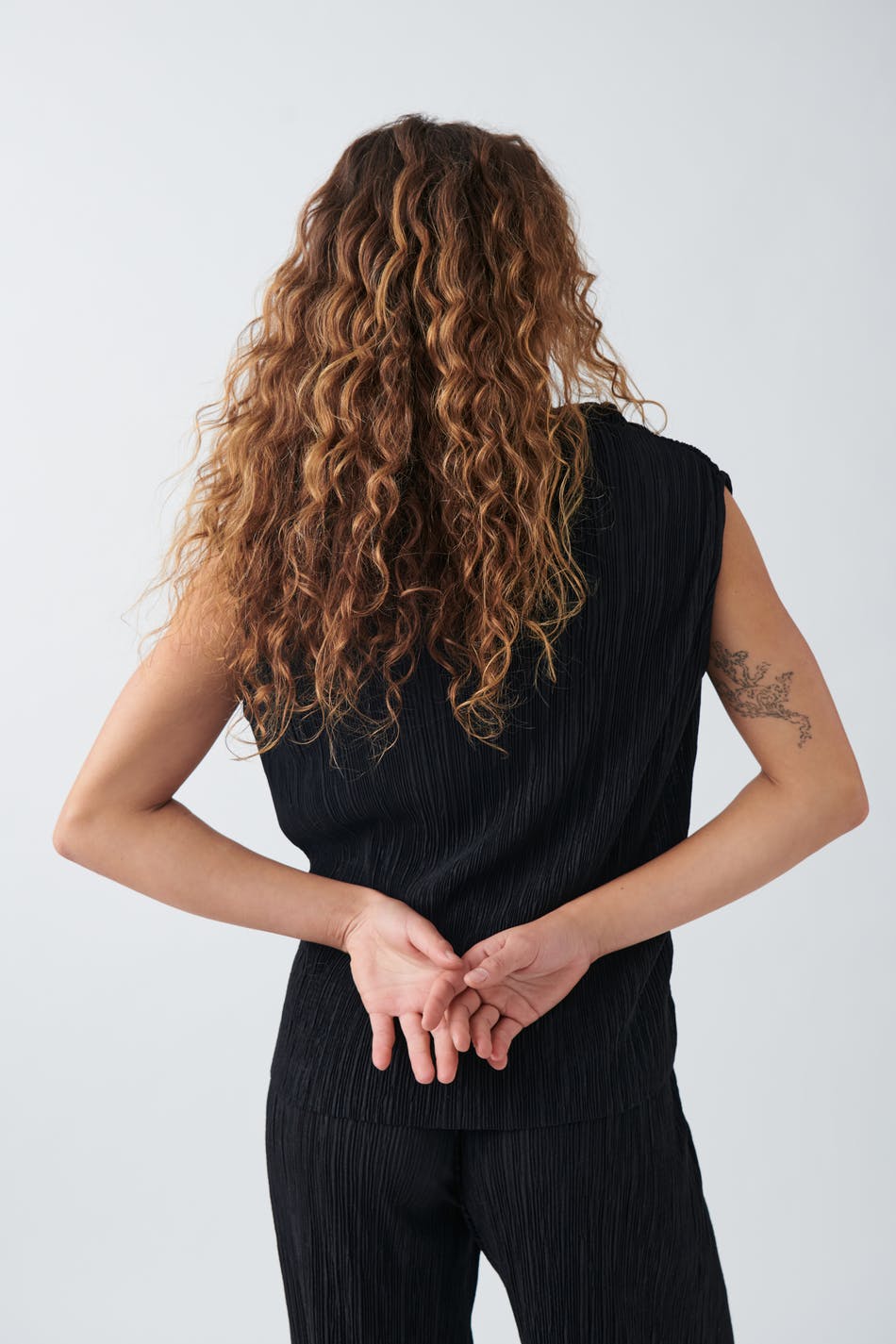 Plisse funnel neck top