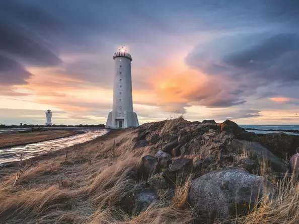 Puzzle 1500 Teile - Magische Stimmung über dem Leuchtturm von Akranes, Island