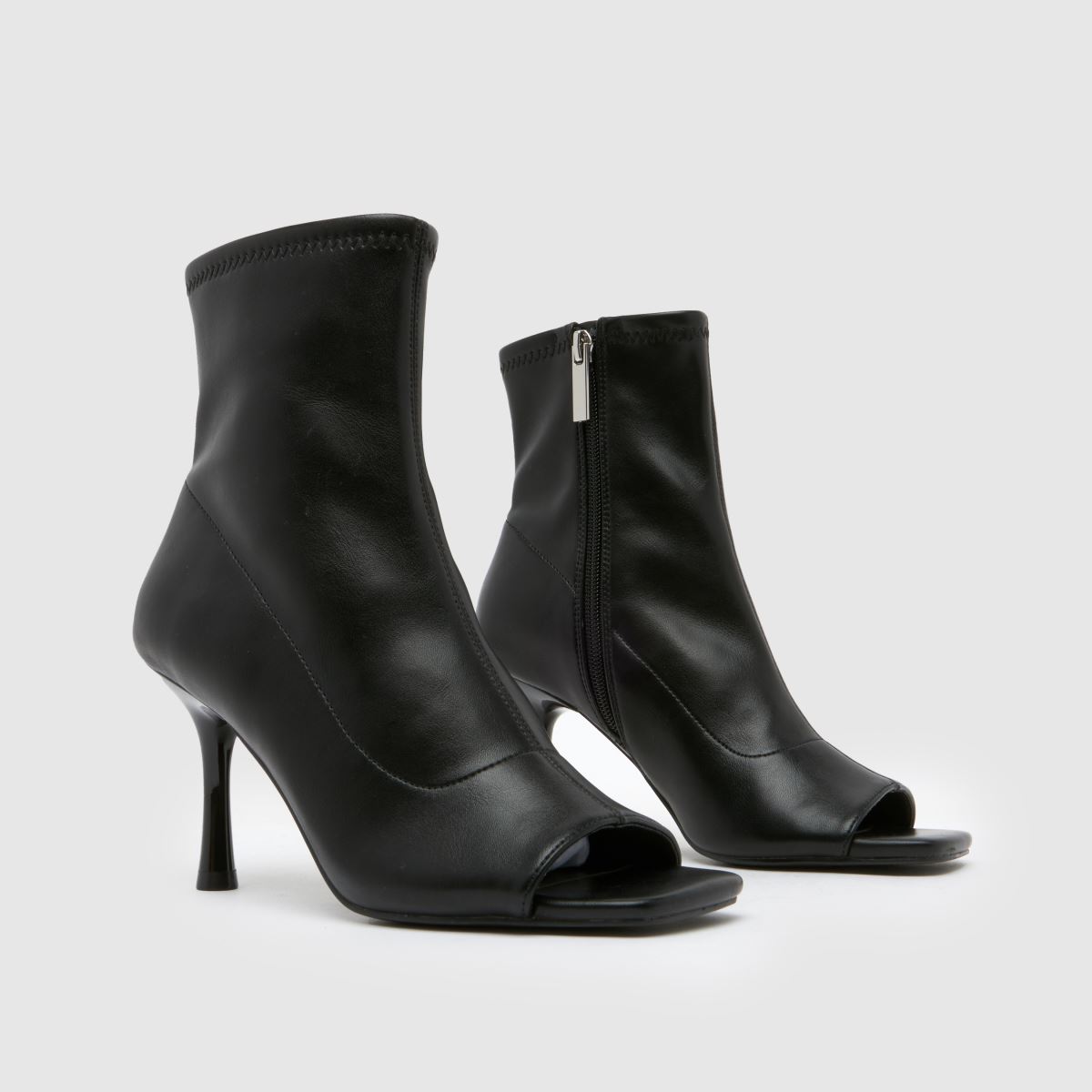 Schuh – Beatrice – Svarta höga klackar med peep toe-mönster