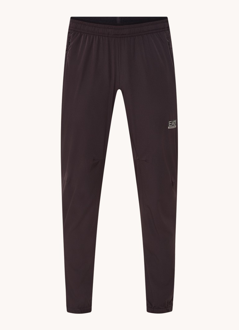 Pantaloni de trening slim fit de la Emporio Armani, cu logo și buzunare laterale.