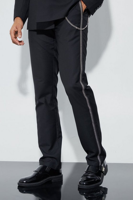 Lockere Hose mit Nieten-Detail und Kette