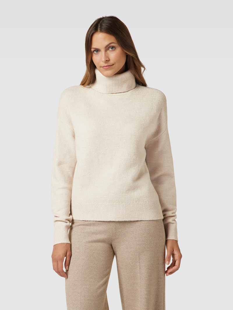 Rollkragenpullover mit überschnittenen Schultern in beige