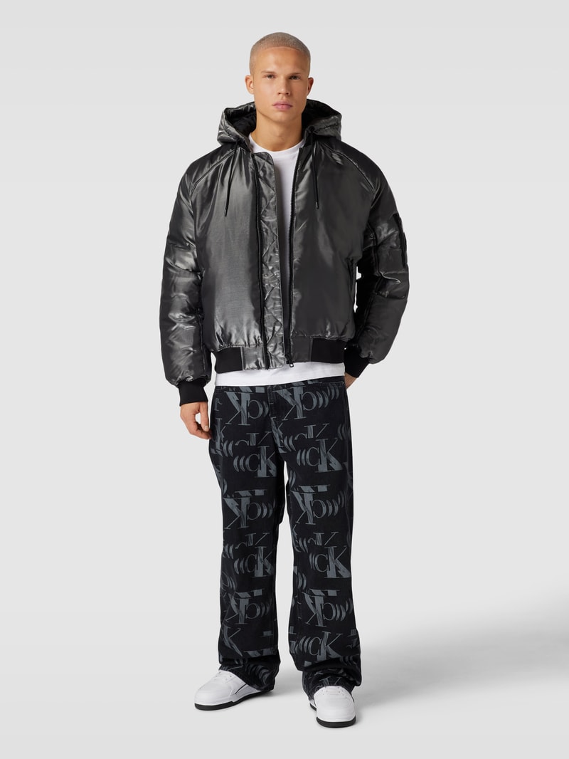 Bootcut Jeans mit Allover-Label-Muster Modell '90 S LOOSE' in black