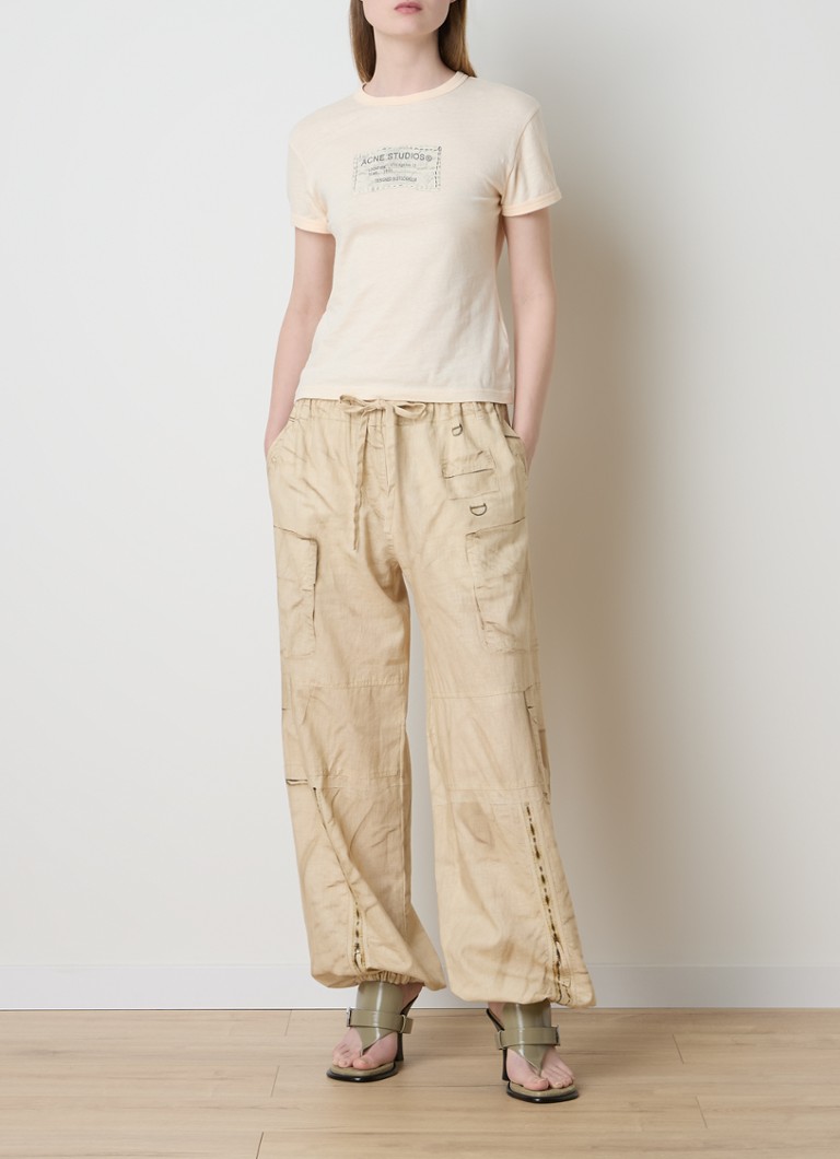 Pantaloni cargo a vita media e affusolati di Acne Studios in misto lino.