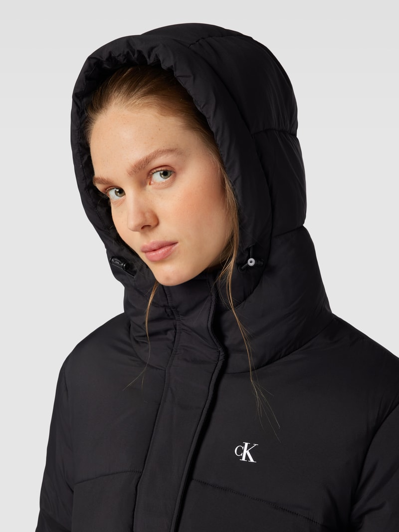 Steppmantel mit Label-Print in black