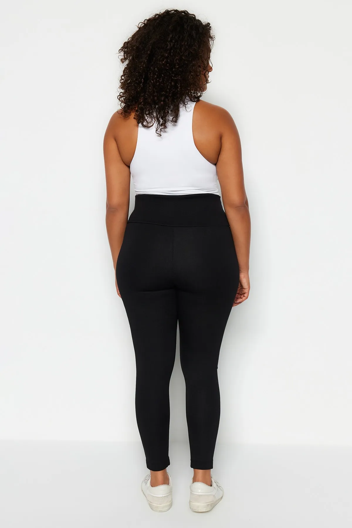 Trendyol Curve  Schwarze Interlock-Strickstrumpfhose im Korsett-Look mit hoher Taille TBSSS23BV00008