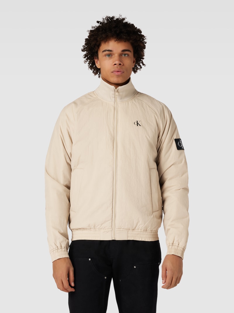 Blouson mit Logo-Print und Eingrifftaschen in beige