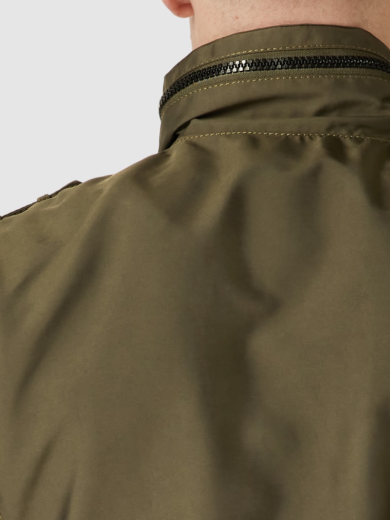 Funktionsjacke mit Stehkragen in olivgrün