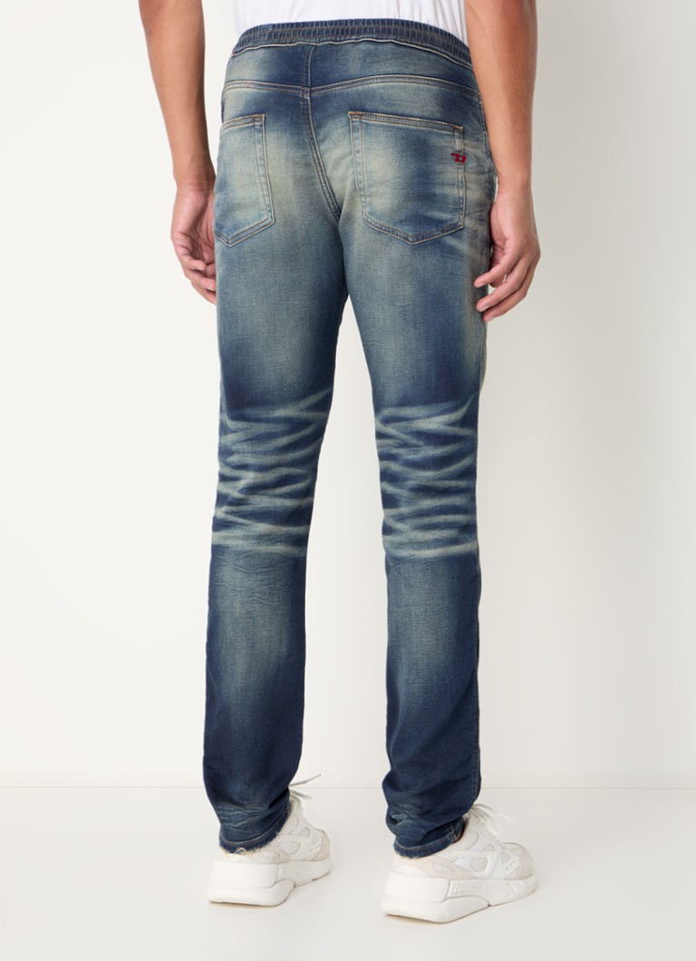 Diesel D-Strukt JoggJeans® pieguļošas džinsa bikses ar mazgātu apdari
