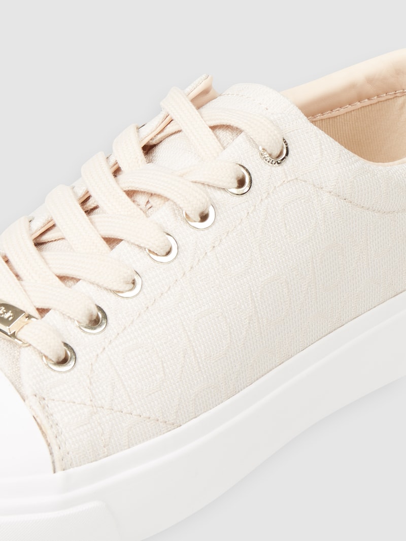 Sneaker mit Logo-Muster in beige