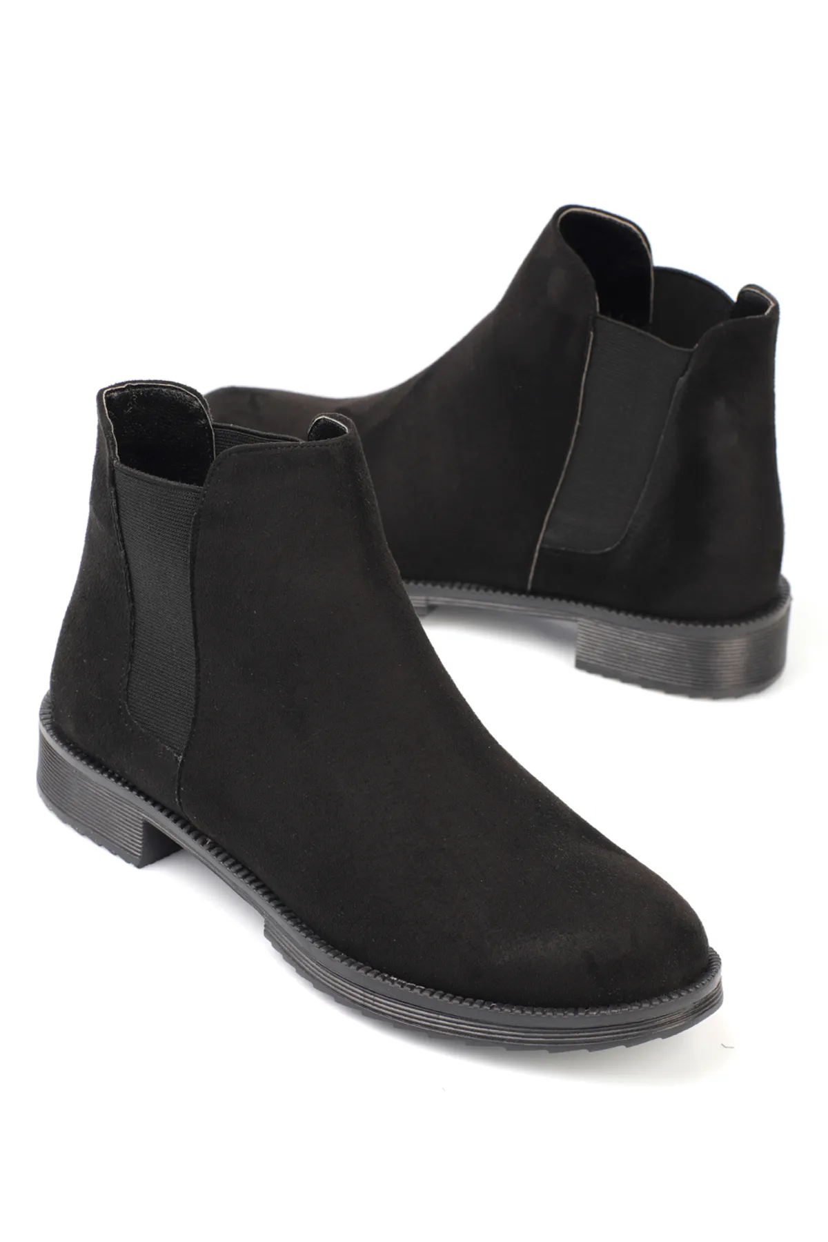 Capone Outfitters  Knöchellange, seitlich elastische Damenstiefel mit runder Zehenpartie