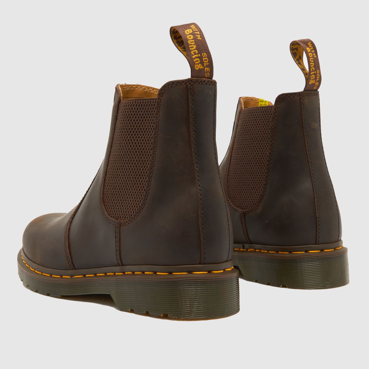 Dr Martens 2976 – Mörkbruna stövlar med gula sömmar