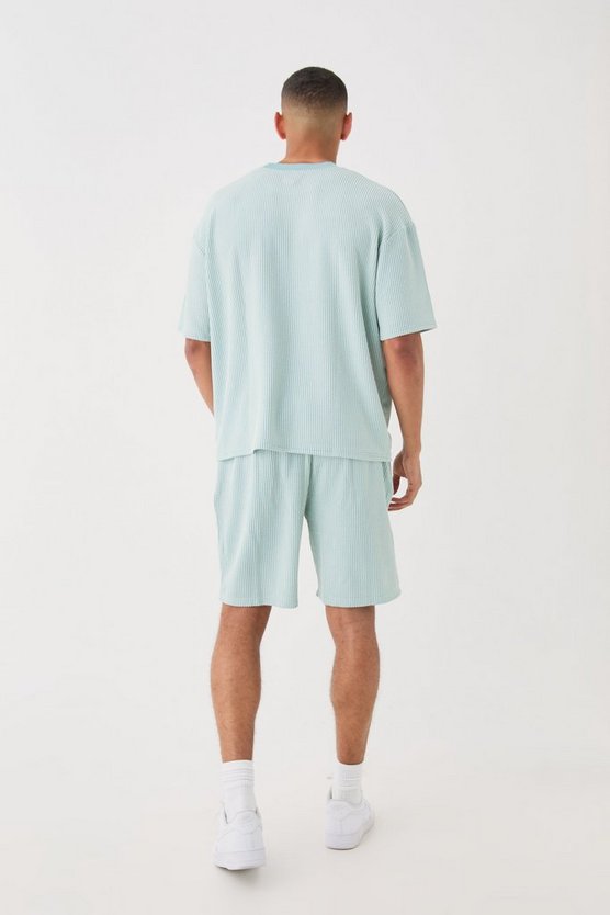 Lockere mittellange strukturierte Shorts mit Streifen