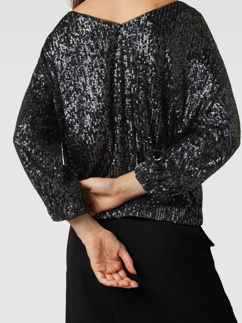Bluse mit Paillettenbesatz in schwarz