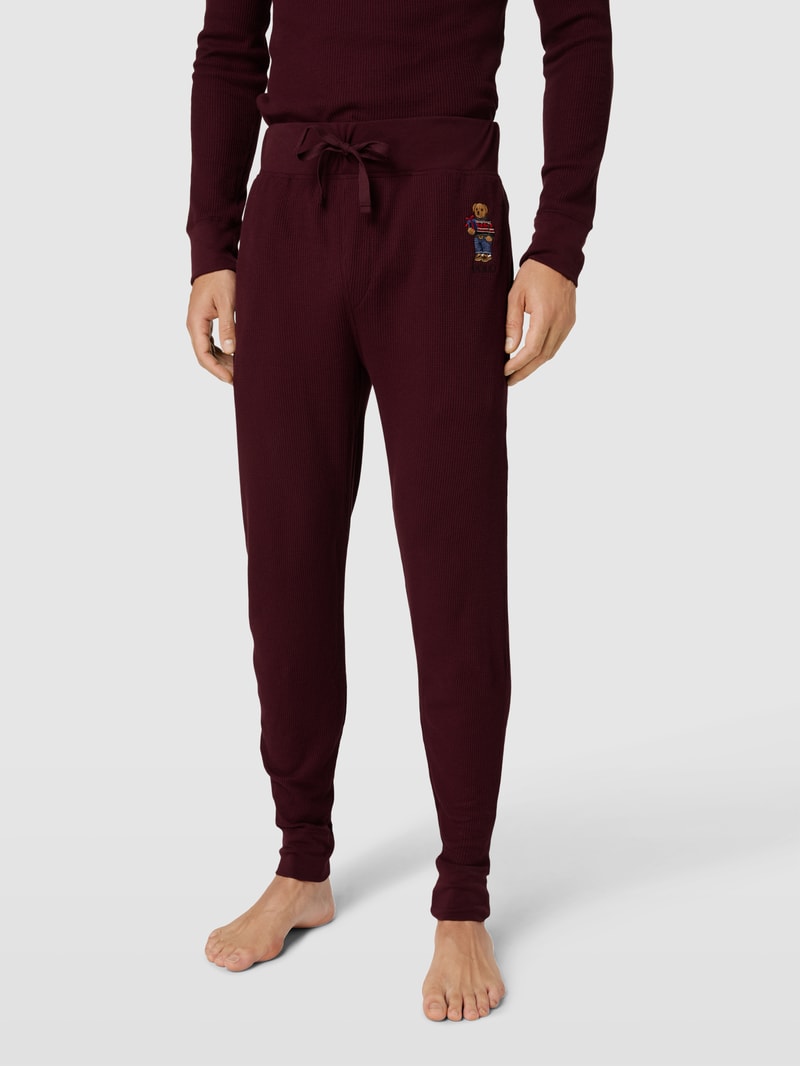 Sweatanzug mit Motiv-Stitching in bordeaux rot