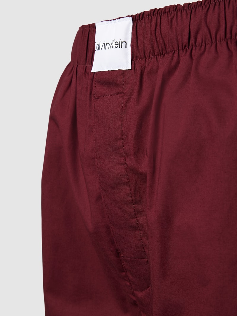 Pyjama-Hose mit Label-Patch in bordeaux rot