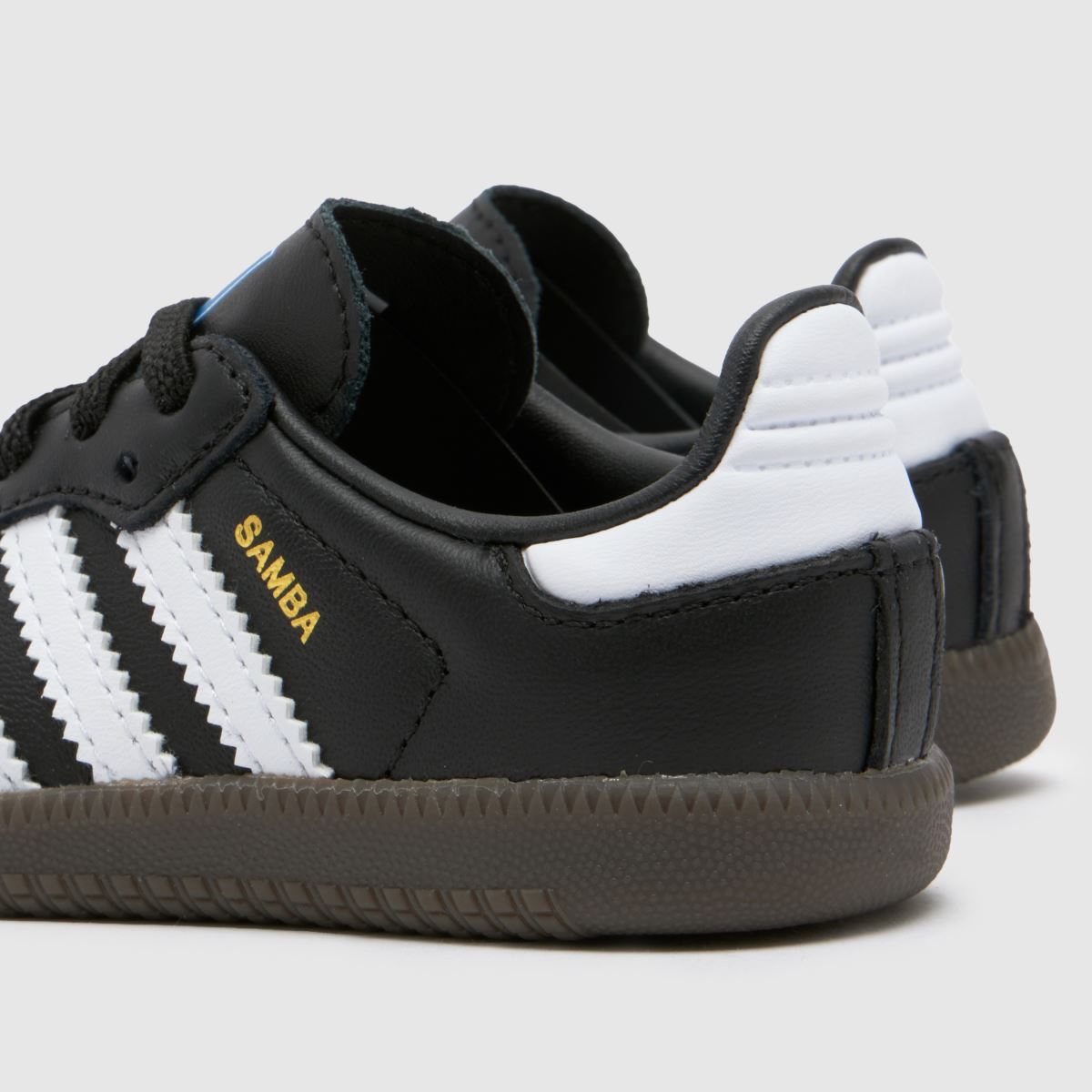 adidas fekete-fehér samba és kisgyermek edzőcipők