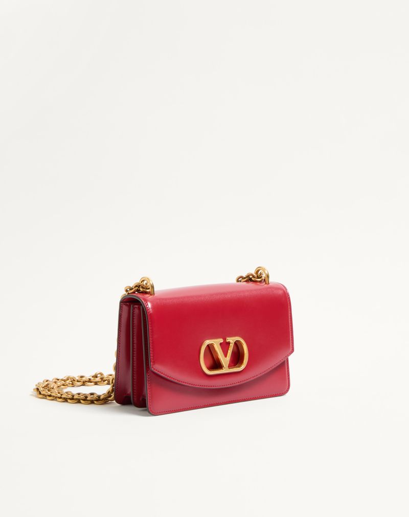 Bolsa de ombro pequena Valentino Garavani Vain em couro de bezerro brilhante