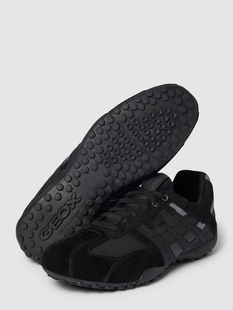 Sneaker mit Kontrastbesatz Modell 'UOMO' in schwarz
