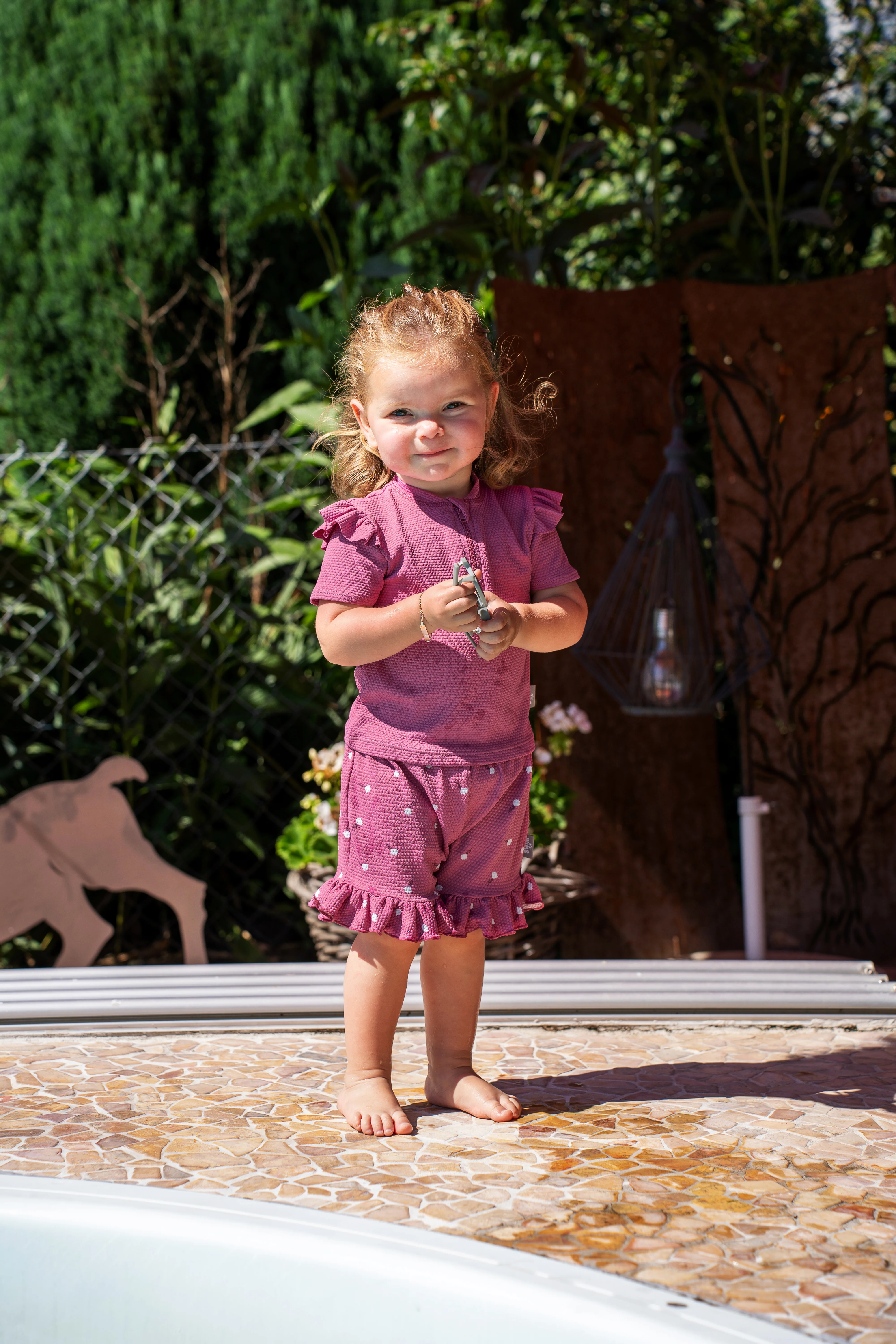 Kinder Badeshorts bedruckt mit kleinen Blumen