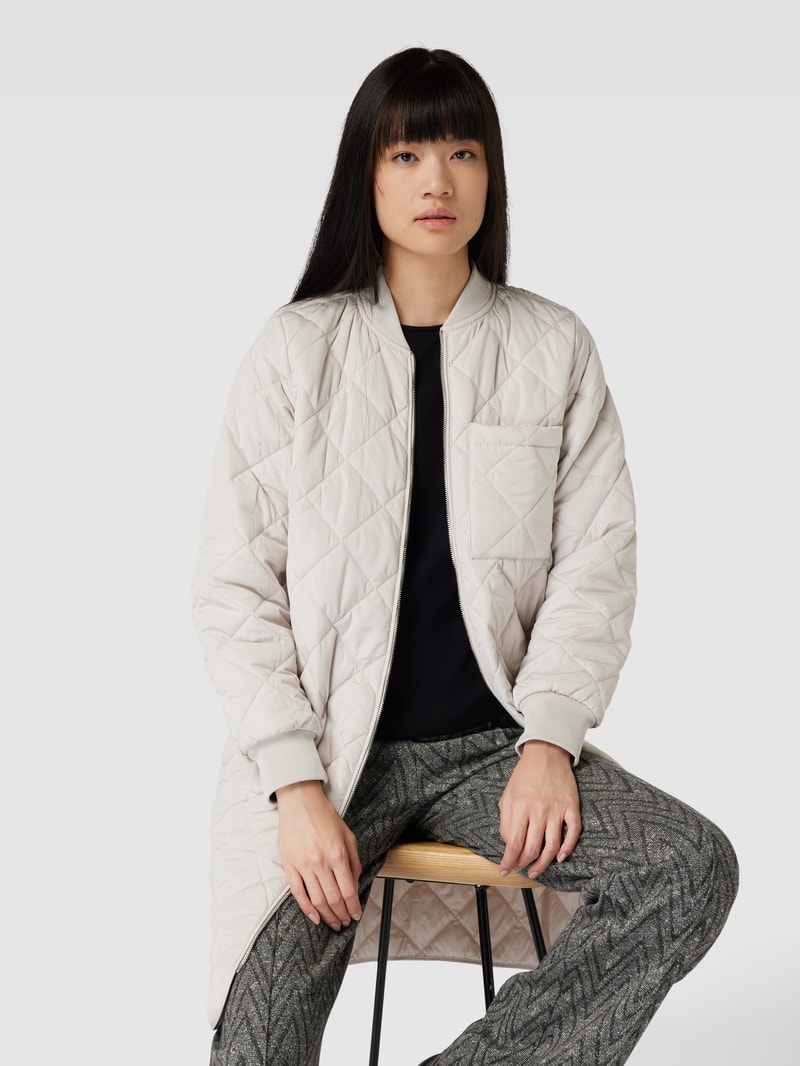 Steppmantel mit Brusttasche in beige