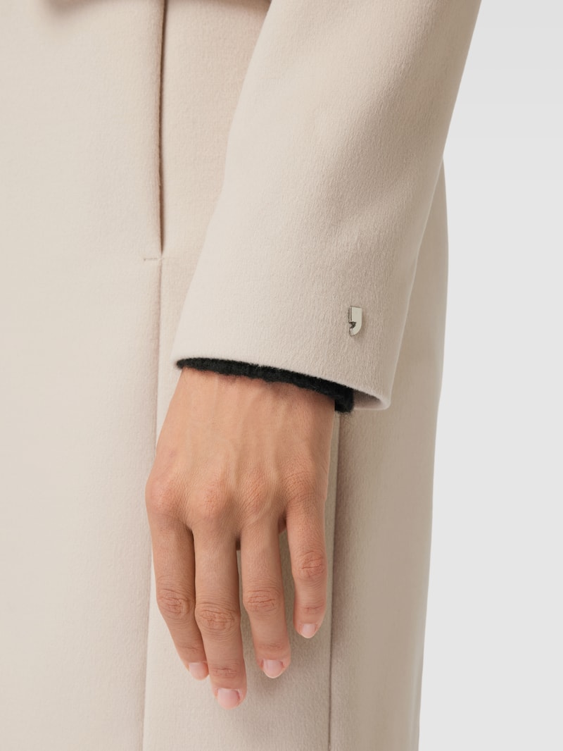 Mantel mit Pattentaschen in offwhite