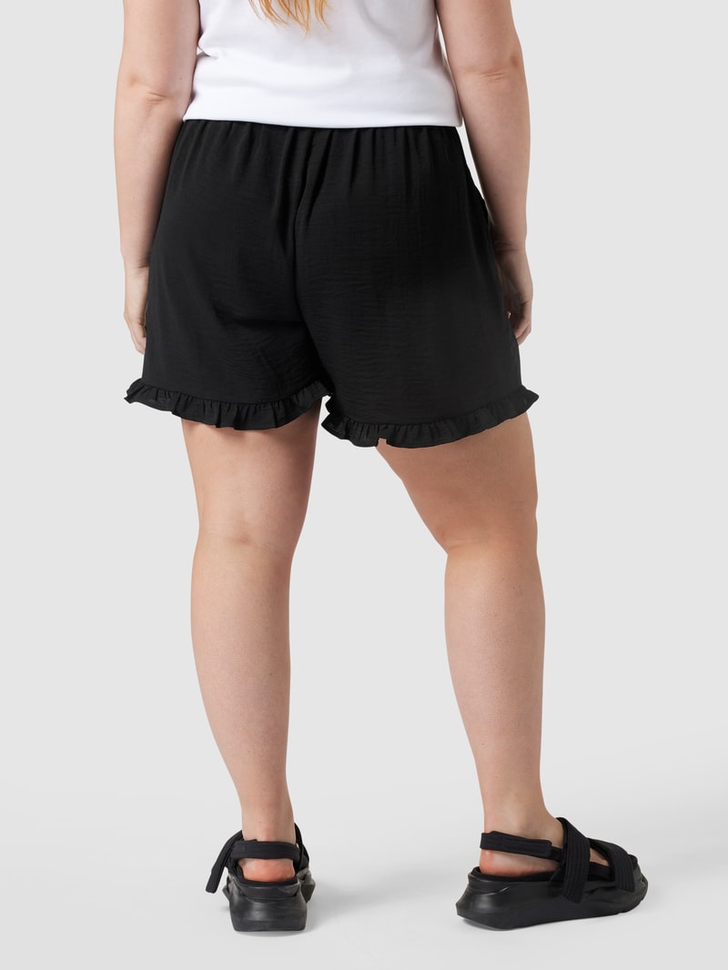 PLUS SIZE Shorts mit Volantsaum in schwarz