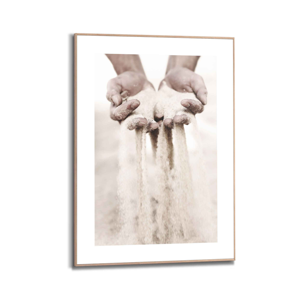 Rahmenbild Hands in Sand