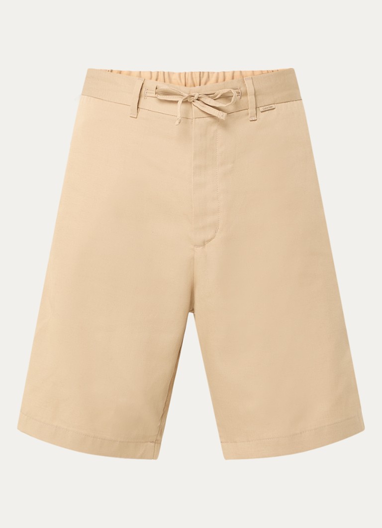 Pantaloni chino cu croi larg, vopsiți în masă, de la Calvin Klein, confecționați dintr-un amestec de in.
