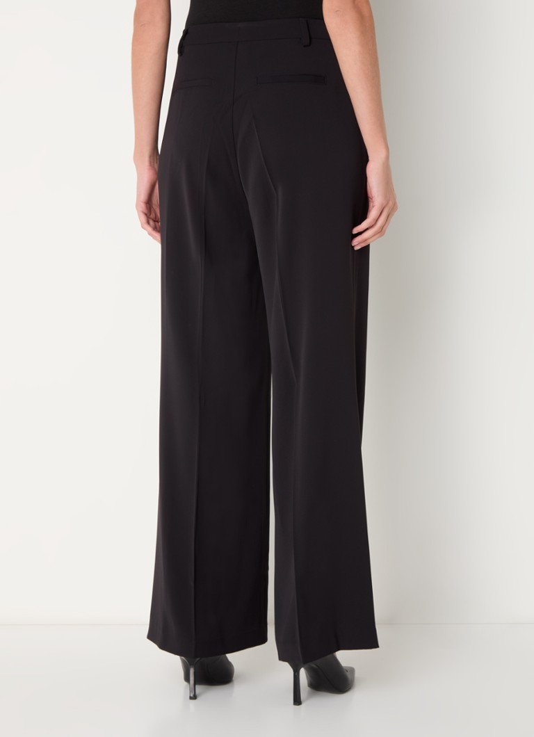 Pantaloni NYDJ cu talie înaltă, cu talie lată și buzunare laterale.