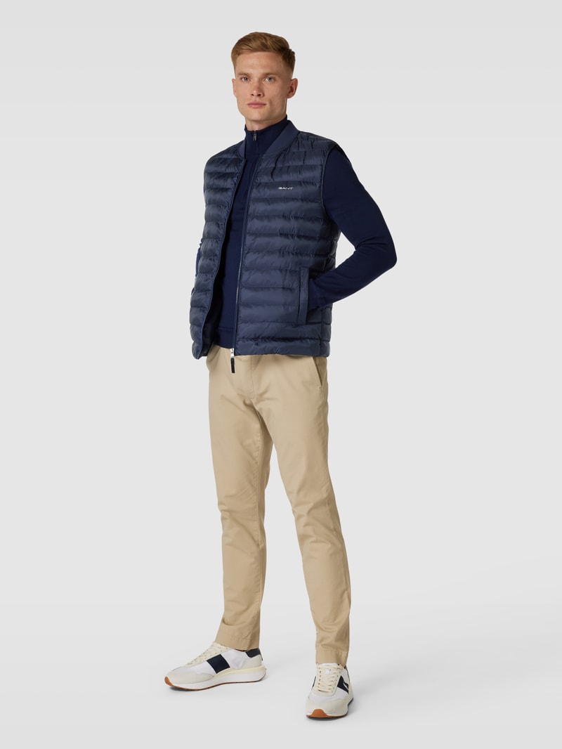 Steppweste mit Label-Print in marineblau