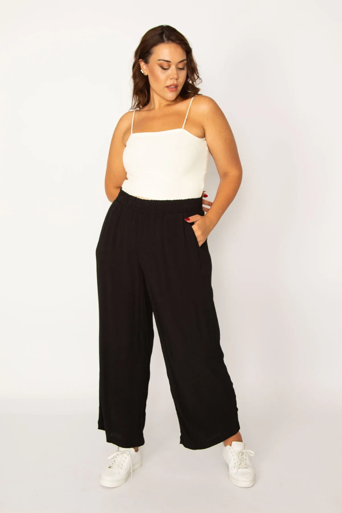Şans  Damen-Hose aus schwarzem gewebtem Viskose-Stoff in gedrehter Größe mit elastischem Bund und Seitentaschen 65n33982