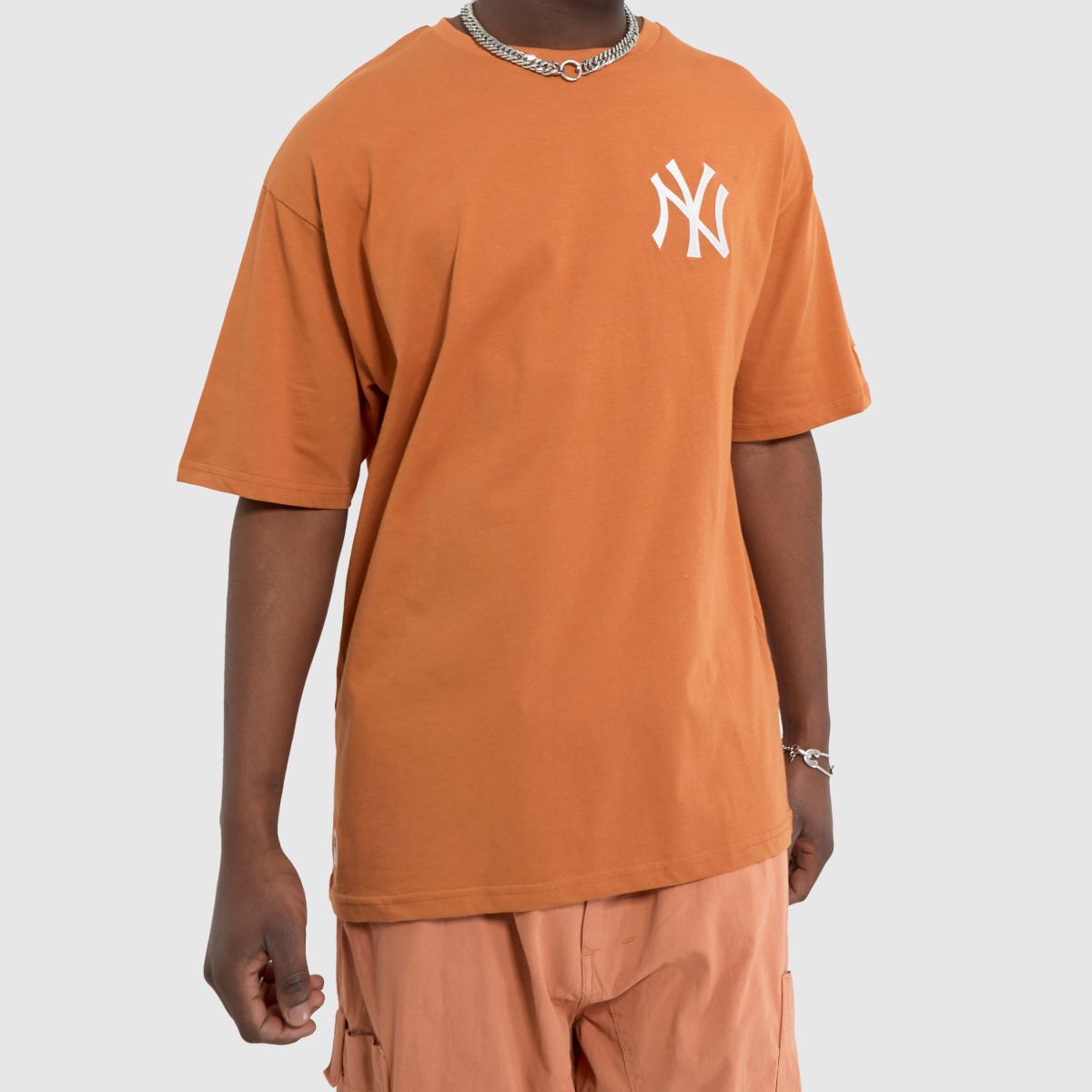 Narancssárga New Era League Essentials póló