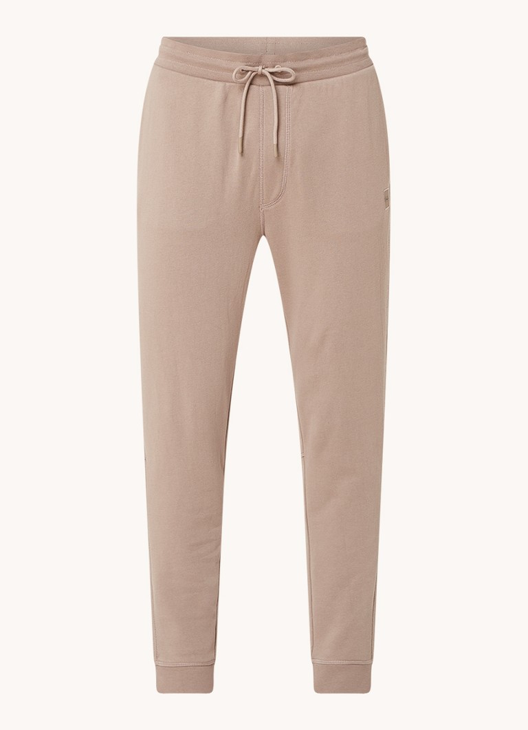 Pantaloni de trening slim fit de la HUGO BOSS, cu logo și buzunare laterale.