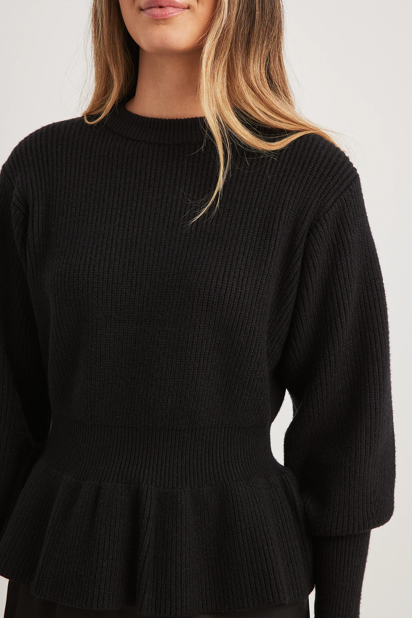 Strickpullover mit Schößchen